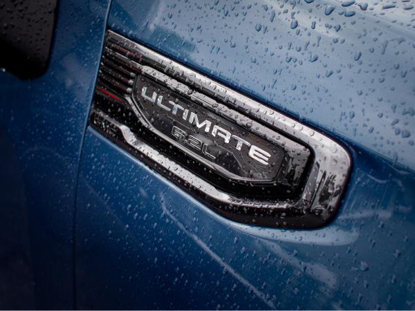 Ultimate badge on the blue Sierra front fender