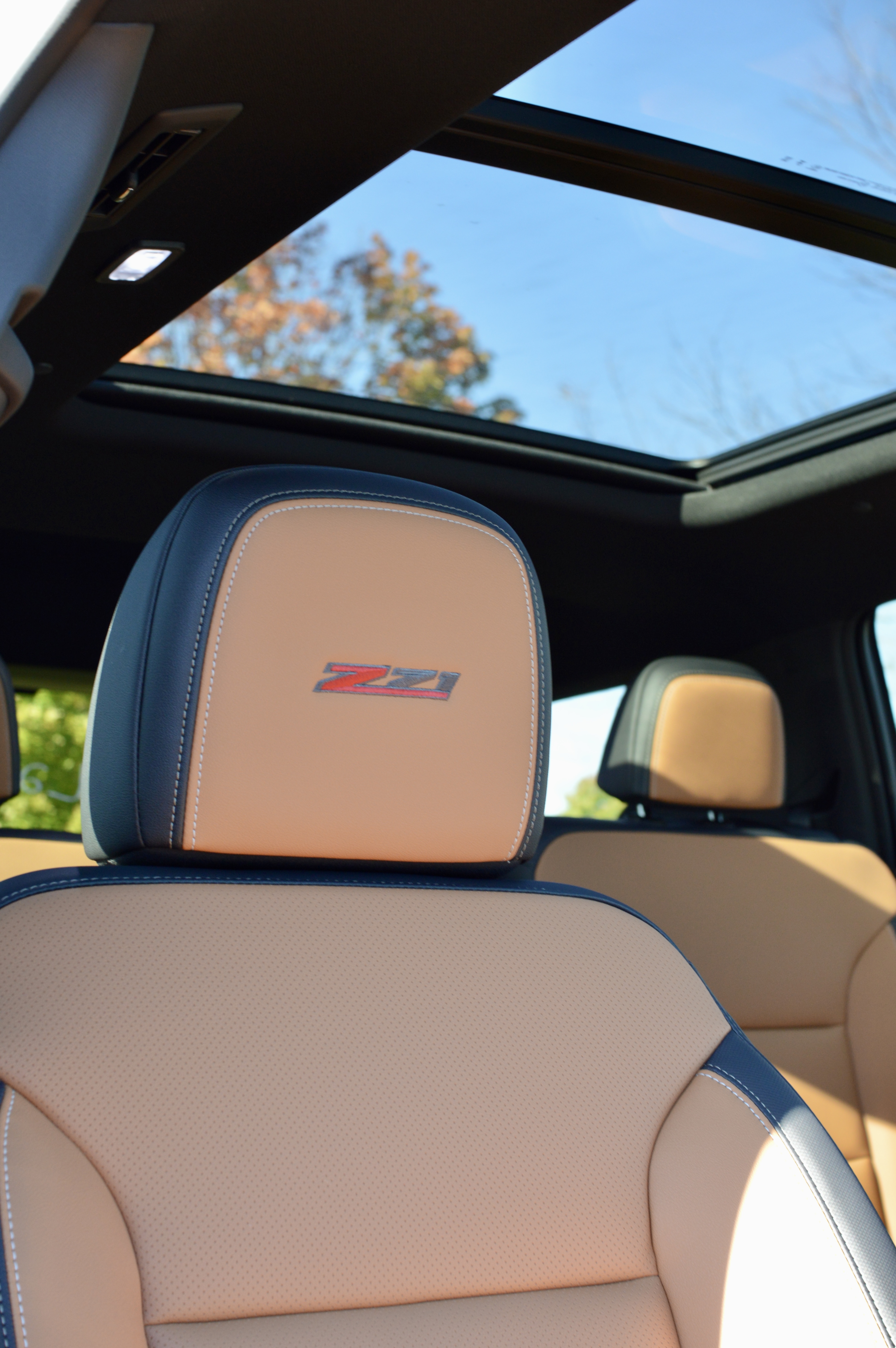 Oregon Tan front seat with Z71 embroidery and the panoramic glass roof above