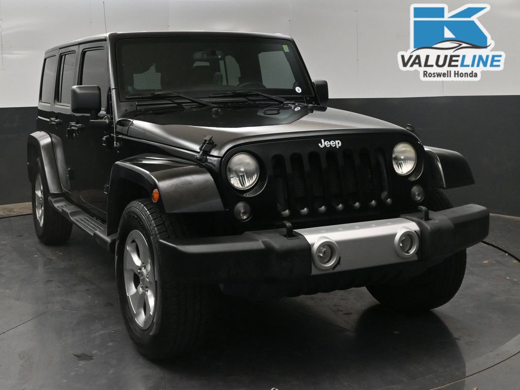 Used 2014 Jeep Wrangler Unlimited Sahara with VIN 1C4HJWEG8EL178687 for sale in Roswell, NM