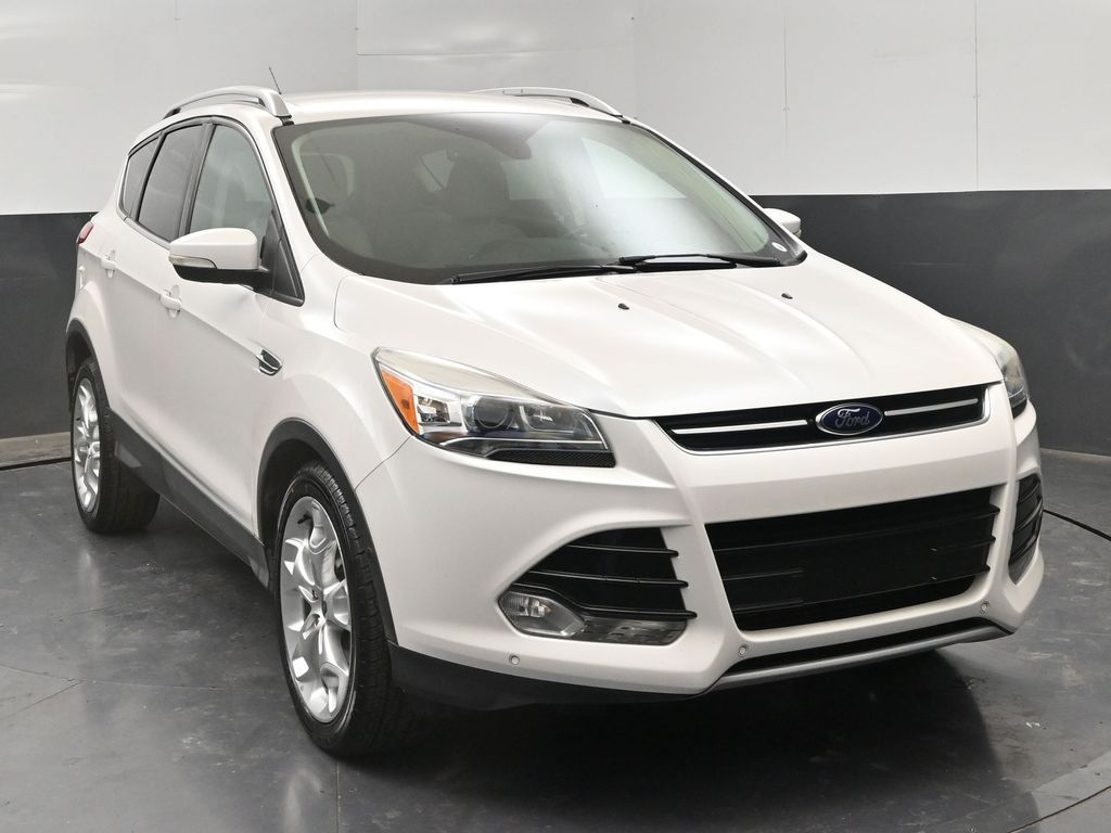 Used 2014 Ford Escape Titanium with VIN 1FMCU0J95EUA69874 for sale in Roswell, NM