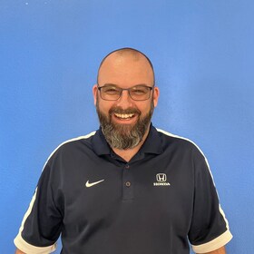 Staff member Chris Sweeney from ID_aae5ec7a73a6
