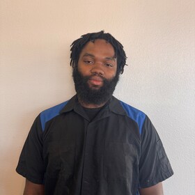 Staff member  Jarquavian Lyles from ID_244a39