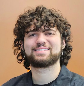 Staff member Sebastian Muniz from ID_575f7c