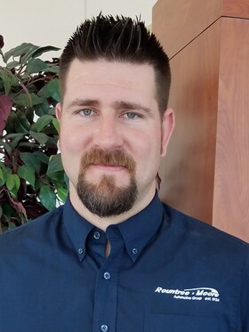 Staff member Aaron Gresham from ID_9b3e74eca444