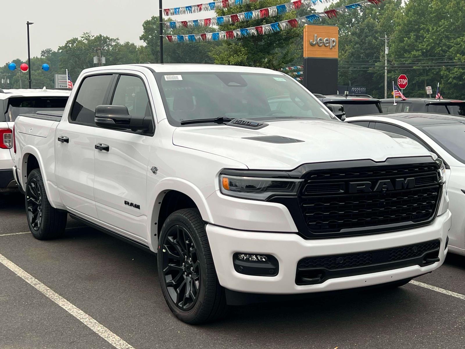 Ivory White Tri-Coat Pearlcoat 2026 RAM 1500 Pickup Truck Four-Wheel Drive 8-Speed Automatic