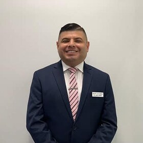 Staff member Rolando Rengel from ID_8a1d11fb0815