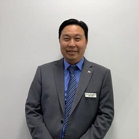 Staff member Yaik Tung from ID_8a1d11fb0815