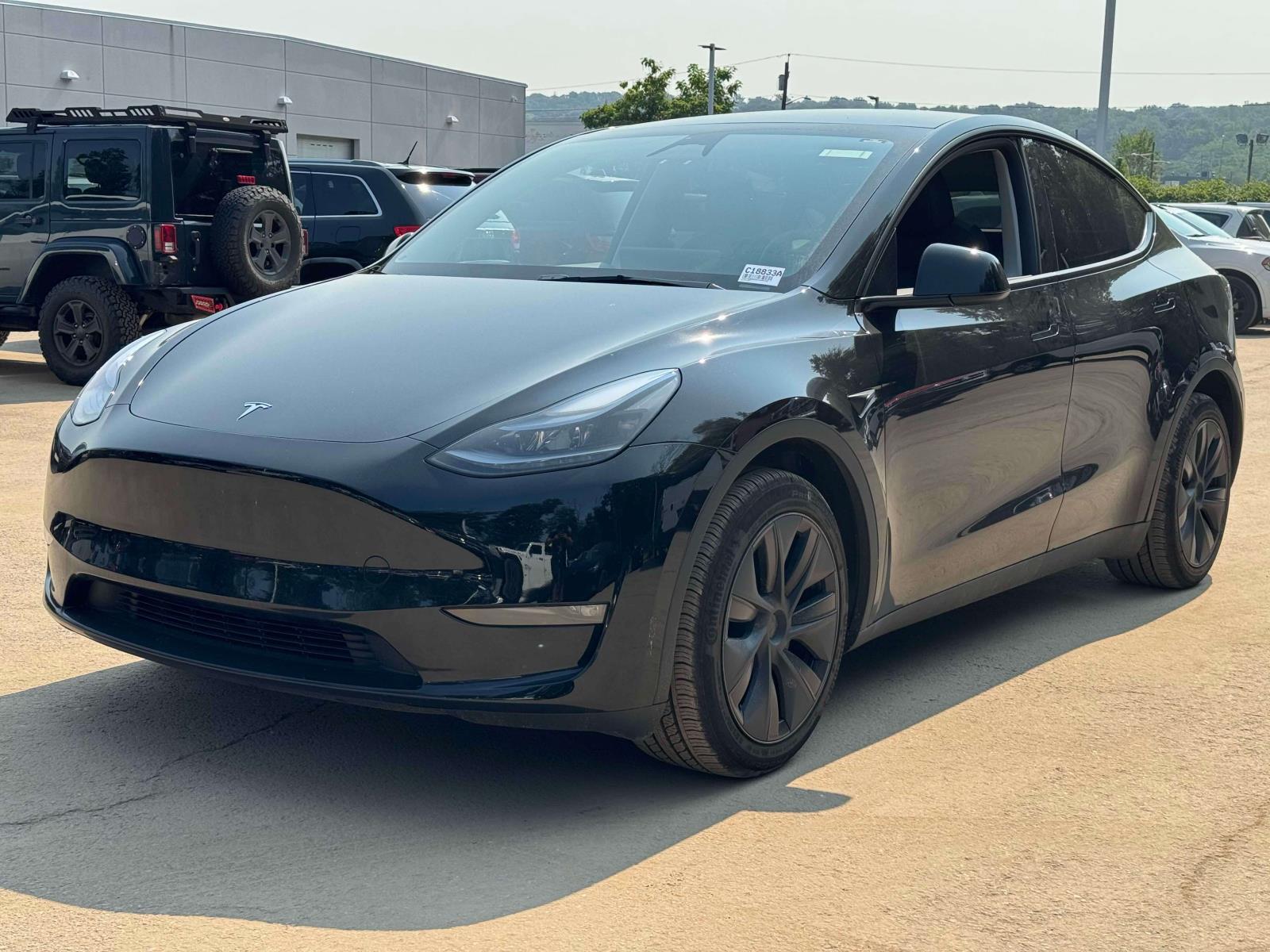 Used 2025 Tesla Model Y Long Range with VIN 7SAYGDEE0SF288572 for sale in Little Falls, NJ