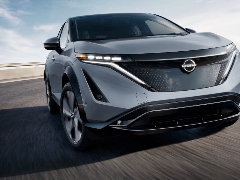 Nissan ARIYA driving on city highway