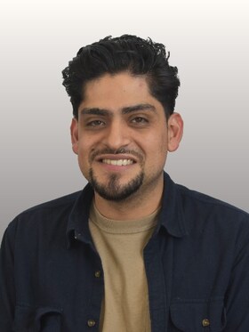 Staff member Erik Mendoza from ID_627c85daf195