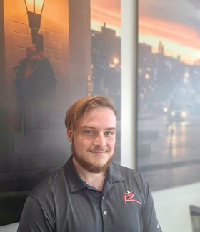 Staff member Kyle Barton from 291b5ecd857e
