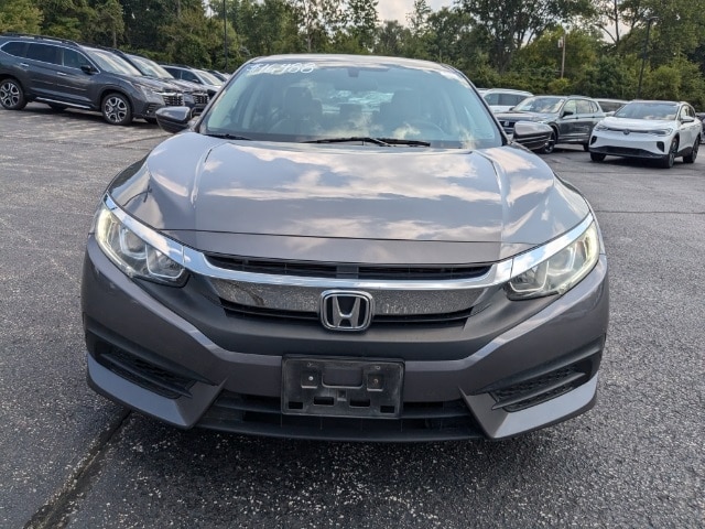 Used 2017 Honda Civic LX with VIN 19XFC2F58HE053032 for sale in Bloomington, IN