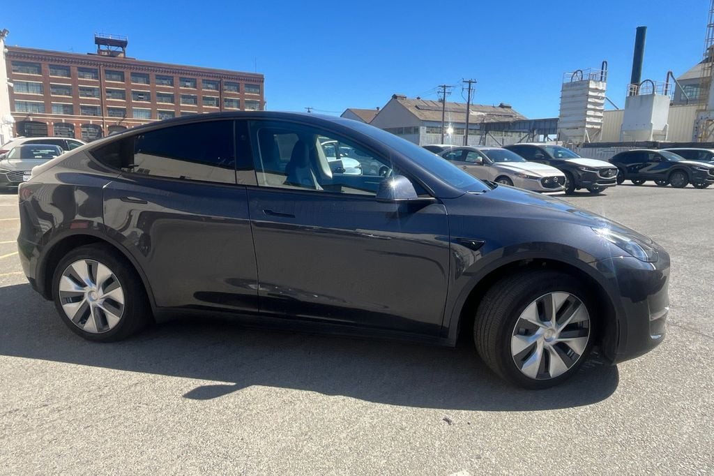 Used 2024 Tesla Model Y Long Range with VIN 7SAYGDED4RF087887 for sale in San Francisco, CA