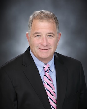 Staff member John May from b23285414dfa