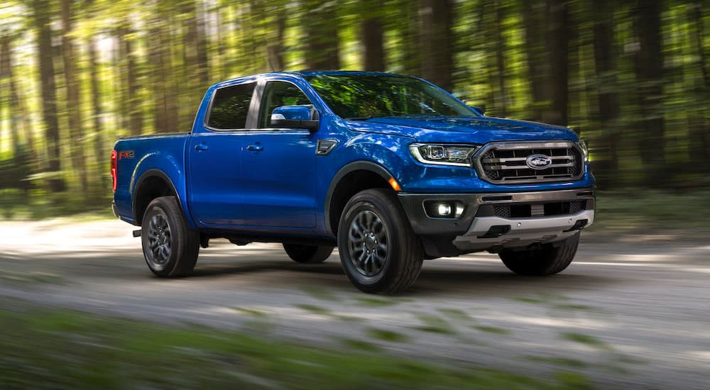 A blue 2019 Ford Ranger is shown from the front at an angle after leaving a dealer that has a Ford Ranger for sale.