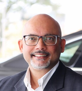 Staff member Tom Zachariah from 0e2f43ef0932