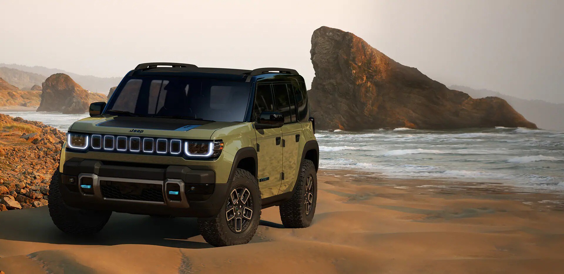Dark Green Jeep Recon parked in a beach area