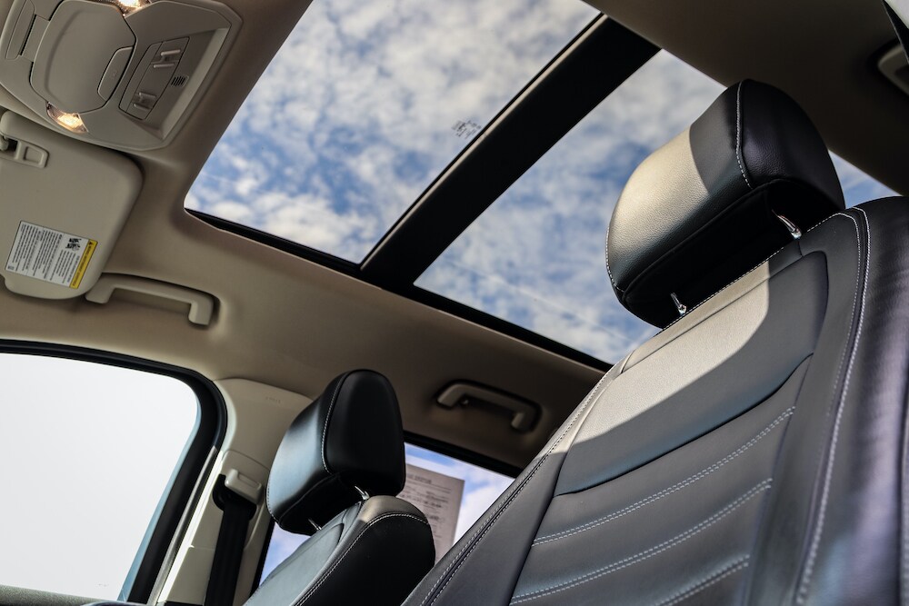 Worm Eye View of Sunroof in Car