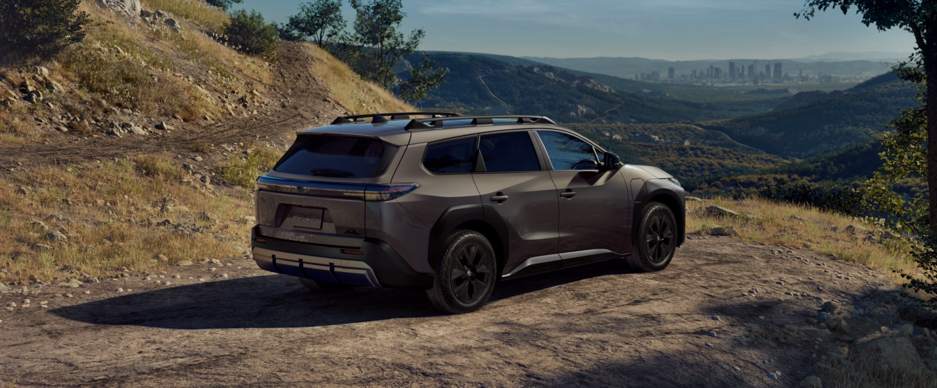 2026-toyota-bz-woodland-outdoors-on-mountain-offroad.png