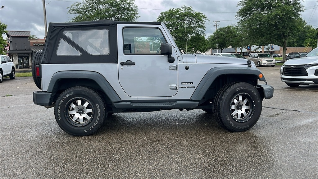 Used 2015 Jeep Wrangler Sport with VIN 1C4AJWAG0FL681879 for sale in New Castle, IN
