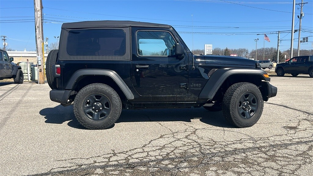 Used 2021 Jeep Wrangler Sport with VIN 1C4GJXANXMW693970 for sale in New Castle, IN
