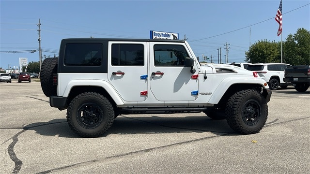 Used 2015 Jeep Wrangler Unlimited Sahara with VIN 1C4BJWEGXFL697988 for sale in New Castle, IN