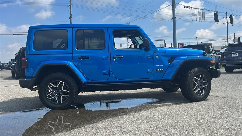 Used 2024 Jeep Wrangler 4-Door Sahara with VIN 1C4PJXEG7RW271206 for sale in New Castle, IN