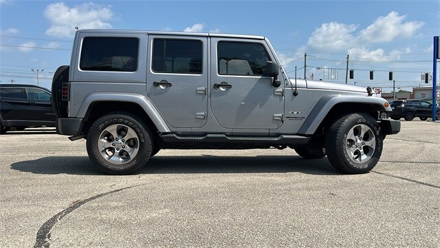 Used 2016 Jeep Wrangler Unlimited Sahara with VIN 1C4BJWEGXGL264253 for sale in New Castle, IN