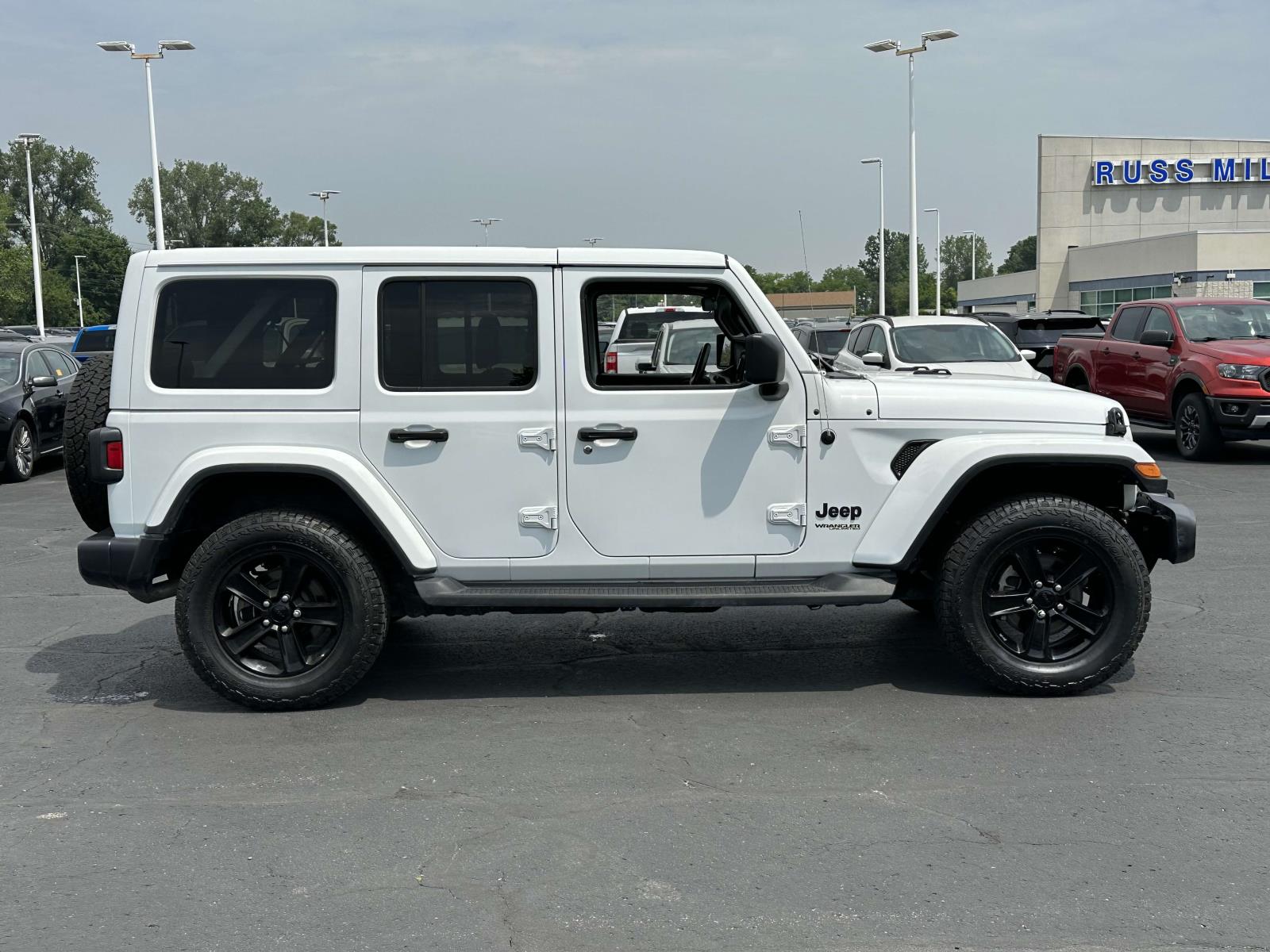 Used 2021 Jeep Wrangler Unlimited Sahara Altitude with VIN 1C4HJXEN4MW732762 for sale in Macomb, MI