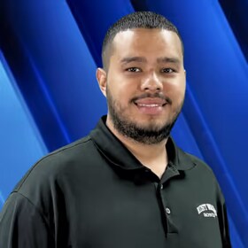 Staff member Carlos Gomez from ID_cddac2