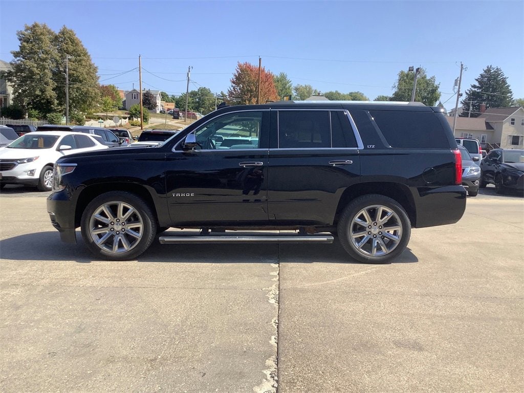 Used 2016 Chevrolet Tahoe LTZ with VIN 1GNSKCKC4GR450663 for sale in Waukon, IA