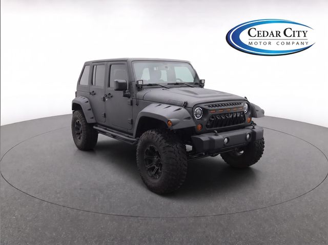 Used 2012 Jeep Wrangler Unlimited Sport with VIN 1C4BJWDG7CL253206 for sale in Cedar City, UT