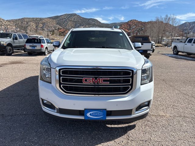 Used 2016 GMC Yukon SLE with VIN 1GKS2AKC4GR428275 for sale in Cedar City, UT