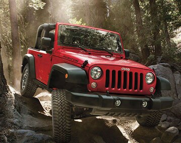 Red Jeep Rubicon with Mopar Lift Kit parts