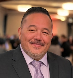 Staff member Milton "Bradley" Robles from ID_d6e749