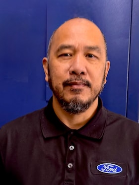 Staff member Edwin Bionson from ID_b45820
