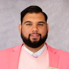 Staff member Temore “Mr. Pink” Aziz-Yankovsky from ID_07bbbc83ebb8