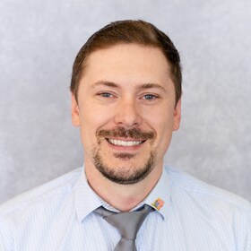 Staff member Corey Brewer from ID_07bbbc83ebb8