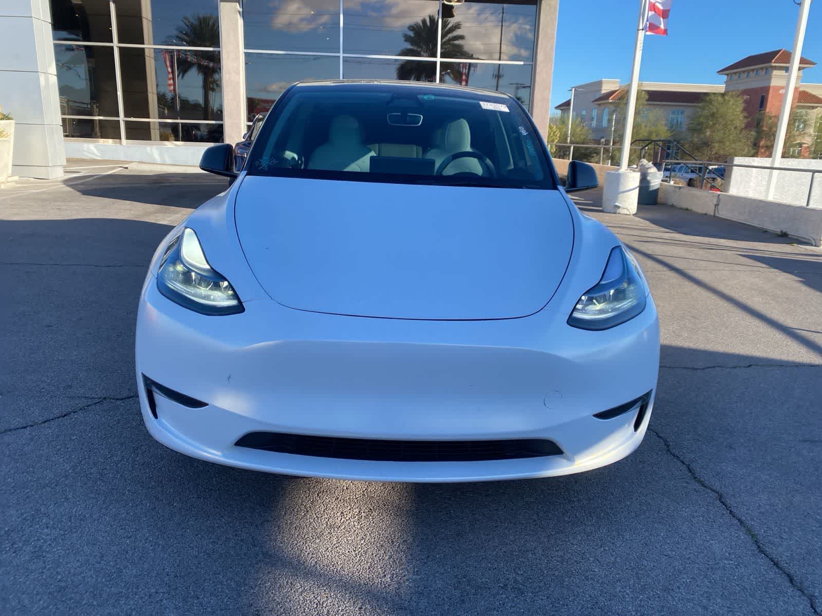 Used 2025 Tesla Model Y Long Range with VIN 7SAYGDED0SF319942 for sale in Kansas City
