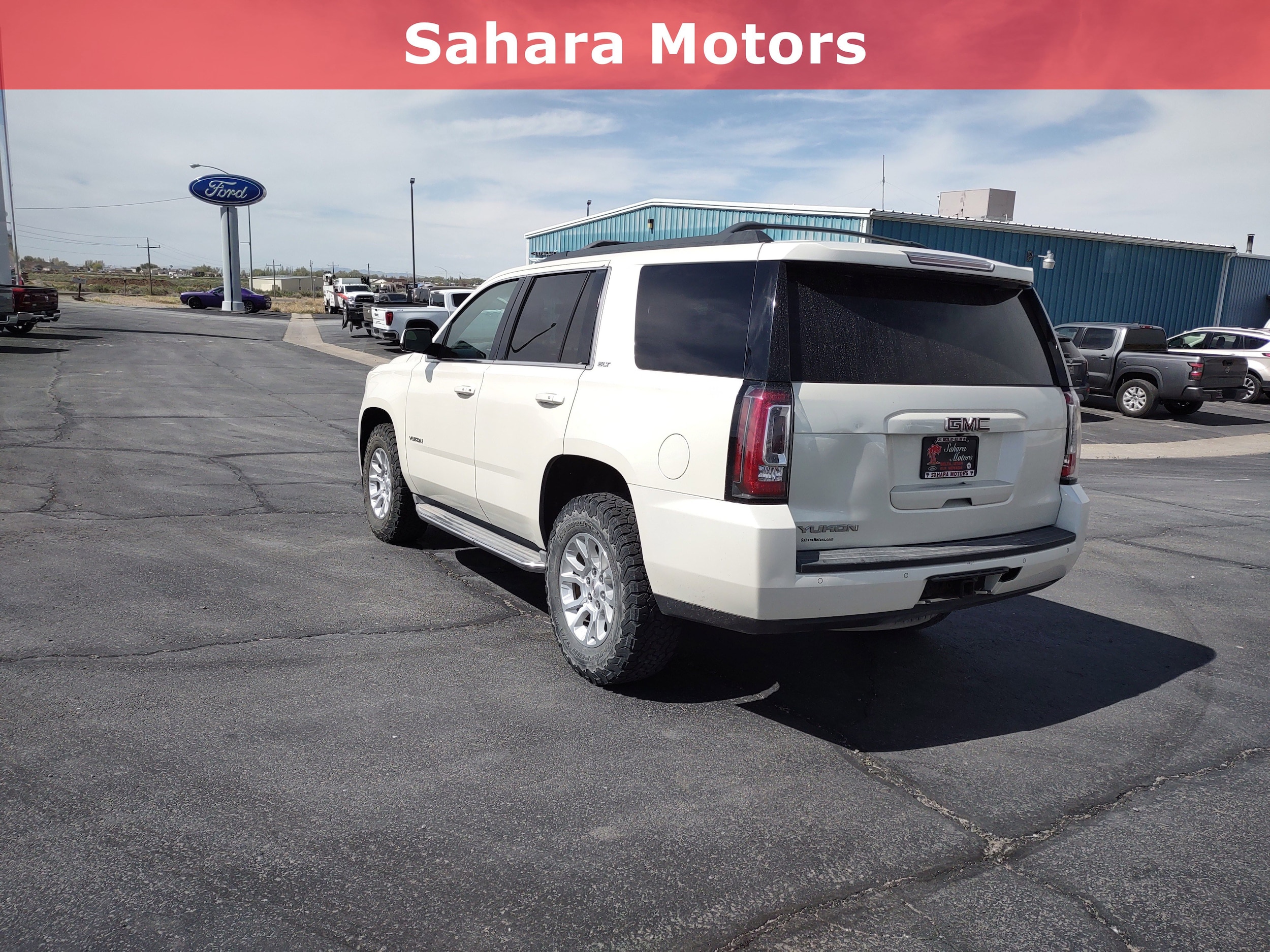 Used 2015 GMC Yukon SLT with VIN 1GKS2BKC3FR597465 for sale in Delta, UT