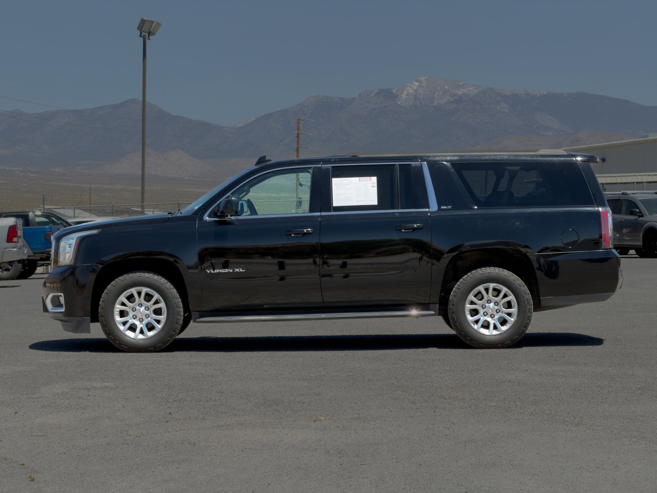 Used 2015 GMC Yukon XL SLT with VIN 1GKS1HKC3FR688161 for sale in Pahrump, NV