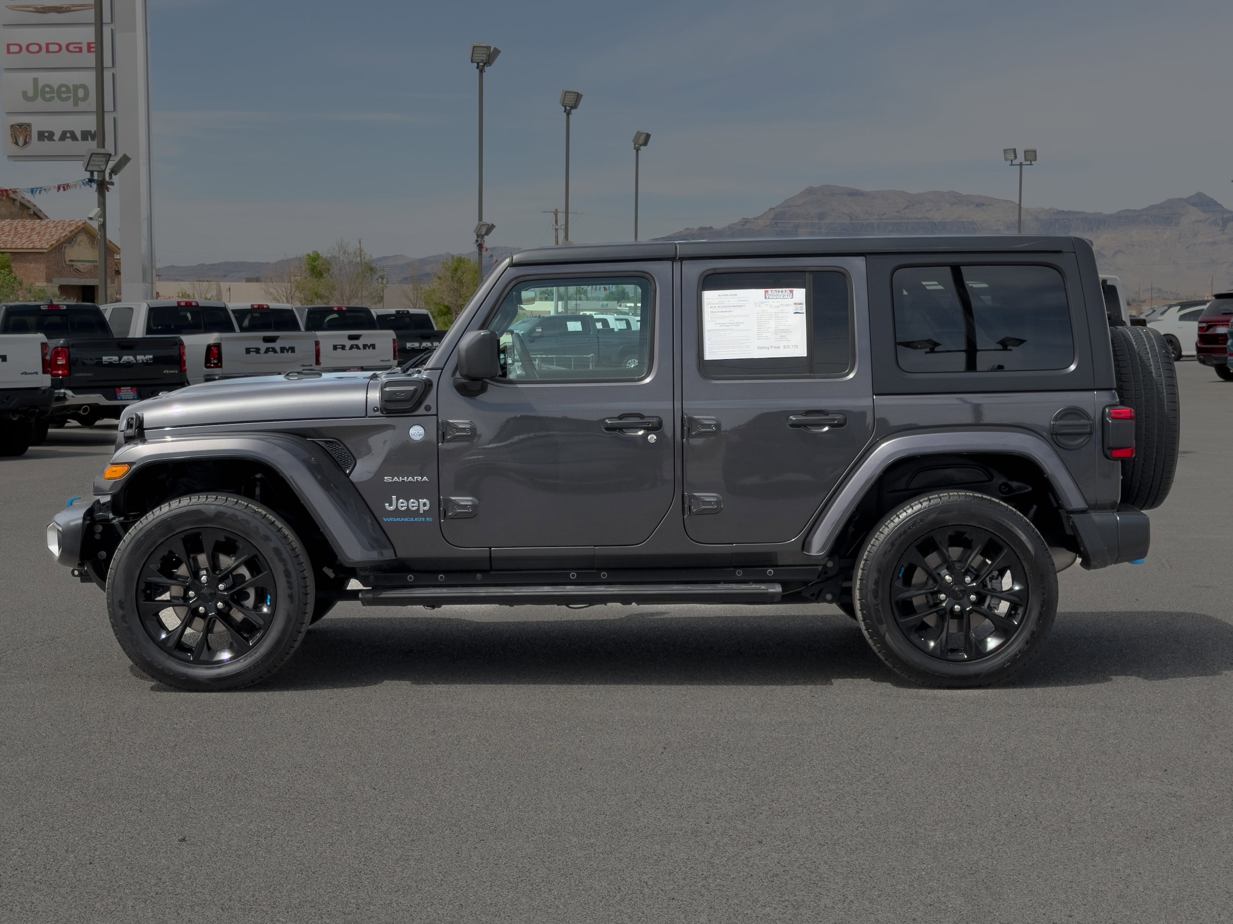 Used 2023 Jeep Wrangler 4xe Sahara 4XE with VIN 1C4JJXP66PW537483 for sale in Pahrump, NV