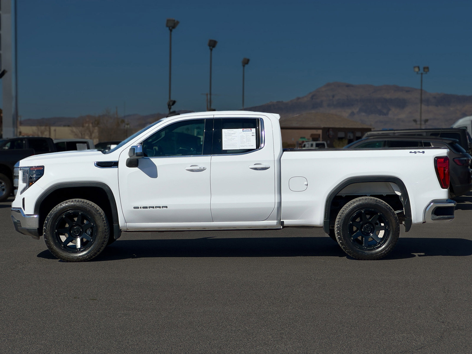 Used 2023 GMC Sierra 1500 SLE with VIN 1GTRUBEK5PZ246324 for sale in Pahrump, NV