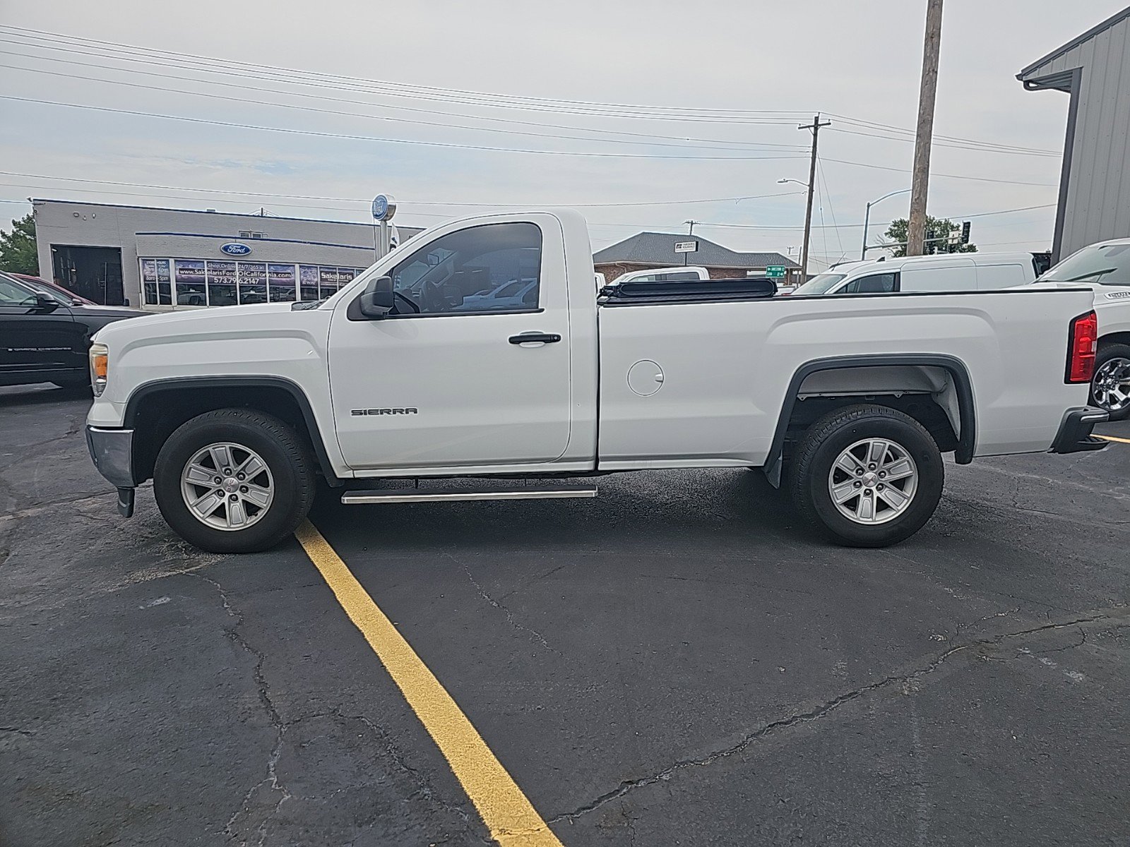 Used 2015 GMC Sierra 1500 1SA with VIN 1GTN1TEC6FZ903068 for sale in California, MO