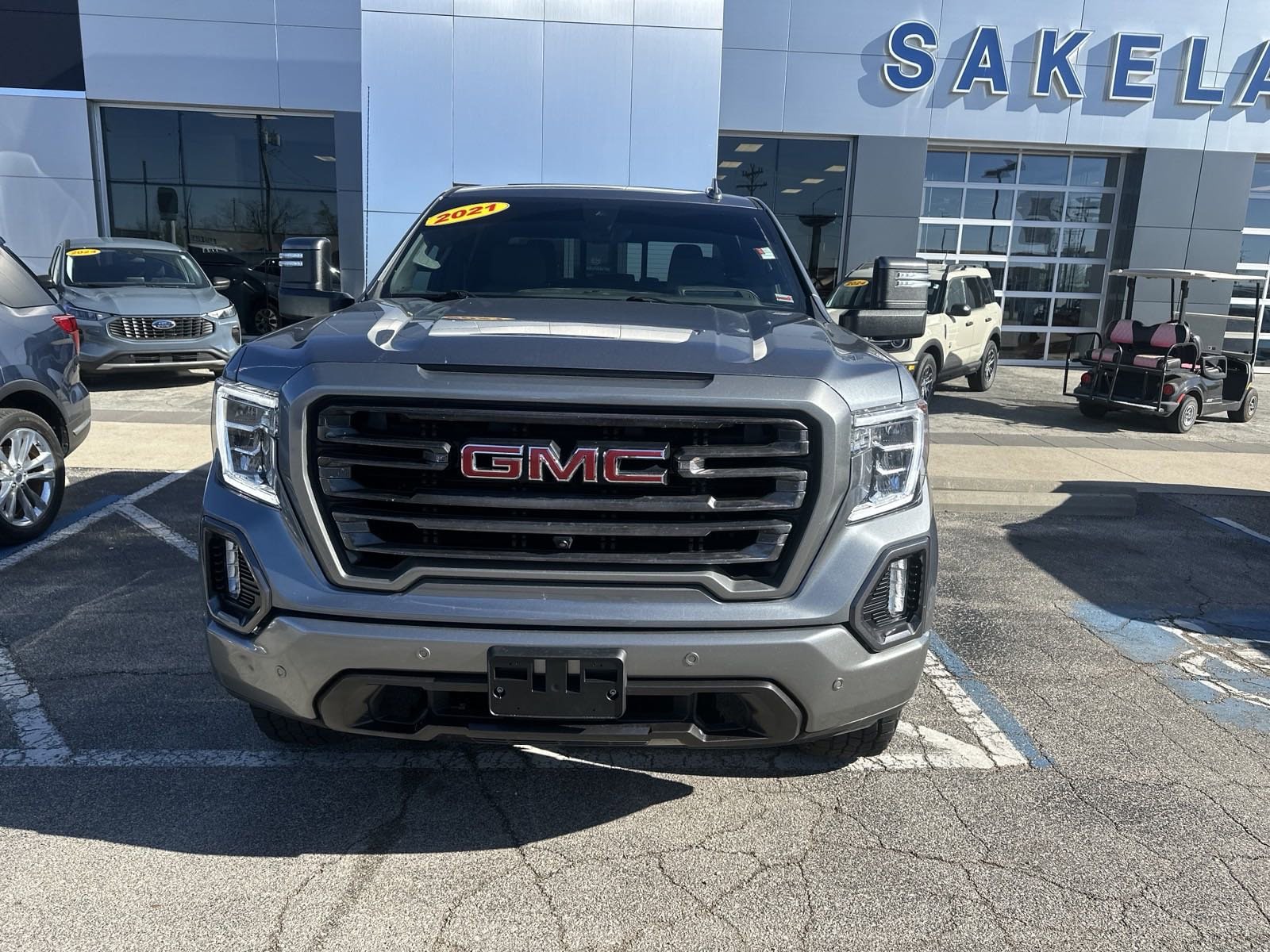 Used 2021 GMC Sierra 1500 SLT with VIN 3GTU9DETXMG233225 for sale in Camdenton, MO