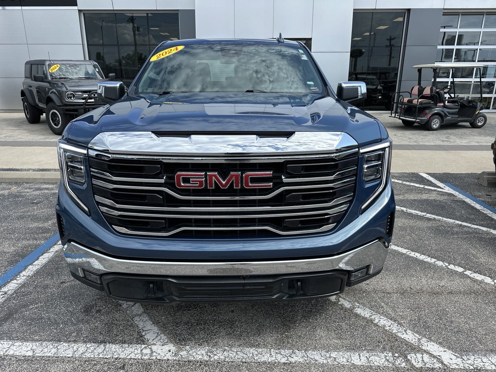 Used 2024 GMC Sierra 1500 SLT with VIN 1GTUUDEDXRZ185367 for sale in Camdenton, MO