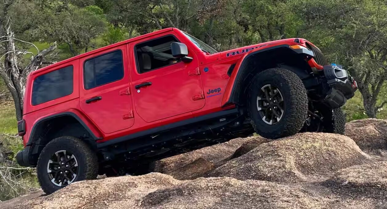 2024 Jeep® Wrangler parked on a rock off-road functionality