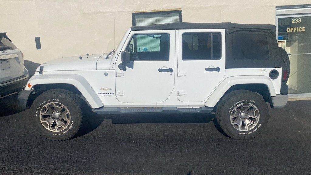 Used 2014 Jeep Wrangler Unlimited Sahara SUV