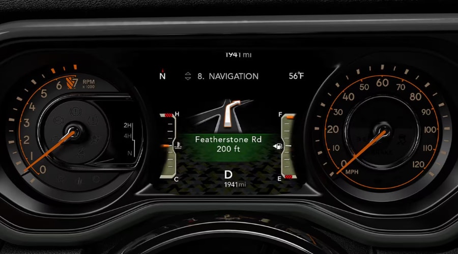 2026 Jeep Wrangler digital instrument cluster showing central turn-by-turn navigation display, analog tachometer, speedometer, and coolant metrics for commuters in Summit, Morristown, and Union County, NJ.