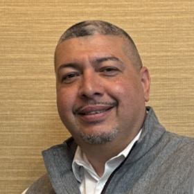 Staff member Carlos Vega from 41eb82c25738